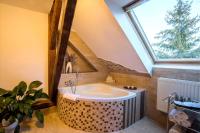 Koupelna v ubytování Wellness hotel & minipivovar Kněžínek