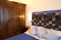 Posteľ alebo postele v izbe v ubytovaní B&B Al Calcandola