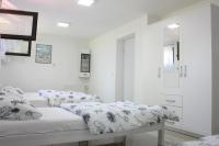 Posteľ alebo postele v izbe v ubytovaní Apartman Maksimir Relax Zagreb-75m2