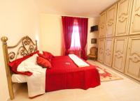 Posteľ alebo postele v izbe v ubytovaní B&B Al Calcandola
