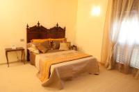 Posteľ alebo postele v izbe v ubytovaní B&B Al Calcandola