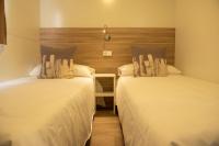 Cama o camas de una habitación en La Noguera Camping