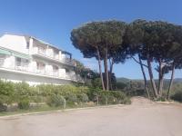 a building with trees on the side of a road at I Casetti in Molini