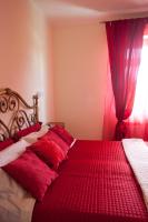 Posteľ alebo postele v izbe v ubytovaní B&B Al Calcandola