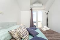 Postel nebo postele na pokoji v ubytování Apartment Horizon