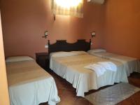 Postel nebo postele na pokoji v ubytování Hotel Sardus Pater