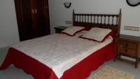 Posteľ alebo postele v izbe v ubytovaní Hostal La Paz