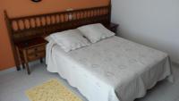 Posteľ alebo postele v izbe v ubytovaní Hostal La Paz