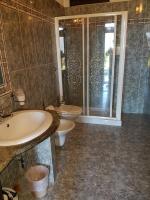 Koupelna v ubytování Hotel Sardus Pater