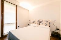 Posteľ alebo postele v izbe v ubytovaní Sirmio Apartments - Primavera Stay