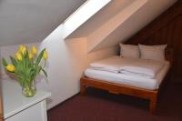 Postel nebo postele na pokoji v ubytování Hotel & Chalets Herrihof