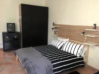 Postel nebo postele na pokoji v ubytování La Sosta Navarra Bed & Beer