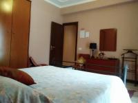 A bed or beds in a room at B&B "Al Calopinace"