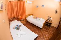 Posteľ alebo postele v izbe v ubytovaní Théa Apartment