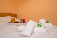 Posteľ alebo postele v izbe v ubytovaní Théa Apartment