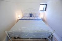 Posteľ alebo postele v izbe v ubytovaní B&B Tenuta Ranieri