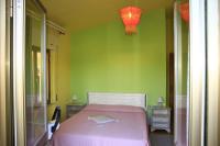 A bed or beds in a room at Addisora Appartamenti