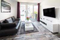 TV a/nebo společenská místnost v ubytování MeerZeit 8 - Norderney - Winterstraße 19