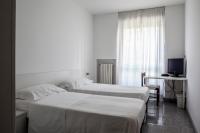 A bed or beds in a room at Bed & Breakfast Cesarina