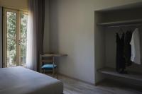 Łóżko lub łóżka w pokoju w obiekcie Hotel Beatrice