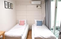 The Blossom Yeonnam Guesthouseにあるベッド