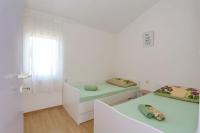 Postel nebo postele na pokoji v ubytování Apartment Dent