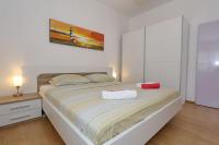 Postel nebo postele na pokoji v ubytování Apartment Dent