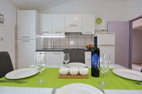 Kuchyň nebo kuchyňský kout v ubytování Apartment Dent
