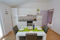 Kuchyň nebo kuchyňský kout v ubytování Apartment Dent