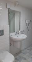 A bathroom at Tempo Life Apartman