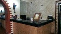 a counter in a room with a mirror on it at Ecotel Quinta Regia in Valladolid