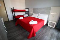 Posteľ alebo postele v izbe v ubytovaní Hotel Kim