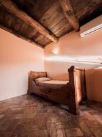 A bed or beds in a room at Il Becco Felice