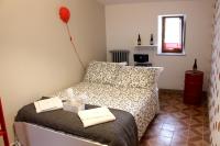 Postel nebo postele na pokoji v ubytování La Sosta Navarra Bed & Beer