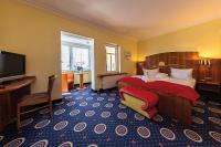 Postel nebo postele na pokoji v ubytování Hotel Deutsche Flagge