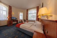Postel nebo postele na pokoji v ubytování Hotel Deutsche Flagge