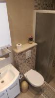 Kúpeľňa v ubytovaní Apartmani Dina