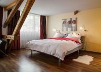 Postel nebo postele na pokoji v ubytování Hotel Metzgern