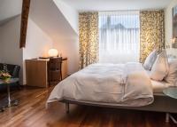Postel nebo postele na pokoji v ubytování Hotel Metzgern