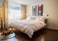 Postel nebo postele na pokoji v ubytování Hotel Metzgern