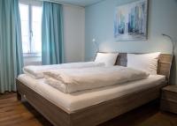 Postel nebo postele na pokoji v ubytování Hotel Metzgern