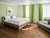 Postel nebo postele na pokoji v ubytování Hotel Metzgern