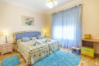 Postel nebo postele na pokoji v ubytování Cubo's Villa San Jose