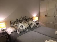 Posteľ alebo postele v izbe v ubytovaní 555 Apartments BCN