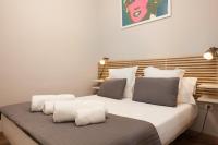 Postel nebo postele na pokoji v ubytování EasySleep Gaudi Terrace