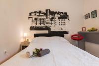 Posteľ alebo postele v izbe v ubytovaní Guest House Beach & City
