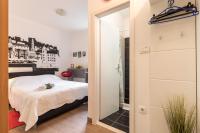 Posteľ alebo postele v izbe v ubytovaní Guest House Beach & City