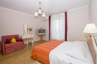 Posteľ alebo postele v izbe v ubytovaní Apartments & Rooms Ribarić