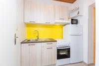 Kuchyň nebo kuchyňský kout v ubytování Apartman Karmen