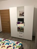 Postel nebo postele na pokoji v ubytování Apartments J&K